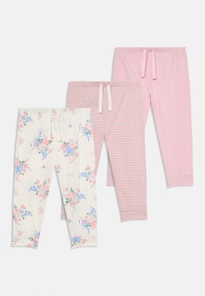 Three pairs of soft cotton pajama pants with drawstrings in pastel pink, pink and white stripes, and white with floral patterns.