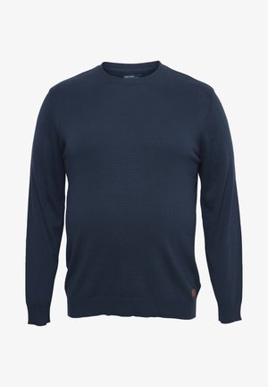 Tummansininen pyöreä kaula-aukko neulepaita pitkillä hihoilla. Valmistettu sileästä neulemateriaalista, jossa on ribbaus hihansuissa ja helmassa, sekä pieni logo-ompelu alareunassa.