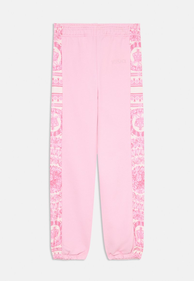 Calças de moletom cor-de-rosa com cintura elástica, apresentando painéis laterais decorados com padrões ornados e punhos elásticos nos tornozelos. Detalhe discreto de logotipo bordado.