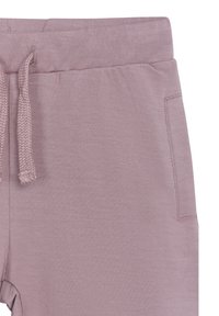 Pantaloni della tuta rosa chiaro con vita elasticizzata e cordoncino, tessuto testurizzato e tasche laterali.