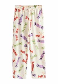 Karamelmønstrede slouchy bukser i creme med elastisk talje. Har multicolorede slik med sløjfer i nuancer af rød, grøn, pink og blå.