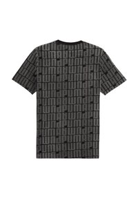 Korte mouw T-shirt in zwart en grijs stof, met een gestructureerd patroon van afwisselend verticale en horizontale lijnen over het oppervlak.