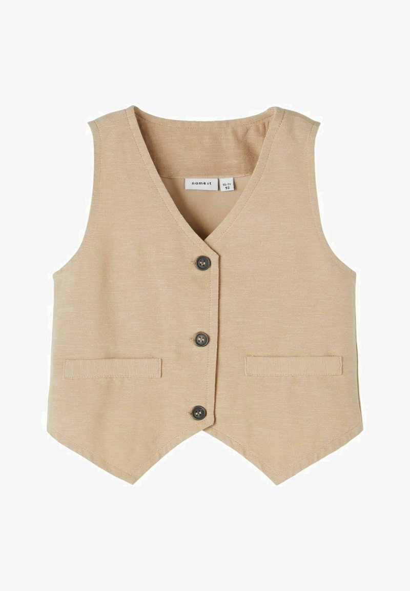 Beige vest met V-hals, knoopsluiting aan de voorkant en twee opgestikte zakken. Gemaakt van een gestructureerde stof met een getailleerde pasvorm.