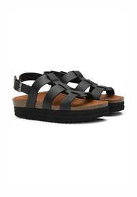 Black sandals with a cork and rubber sole, featuring crisscross straps and an adjustable ankle strap. Smooth texture and flat design.