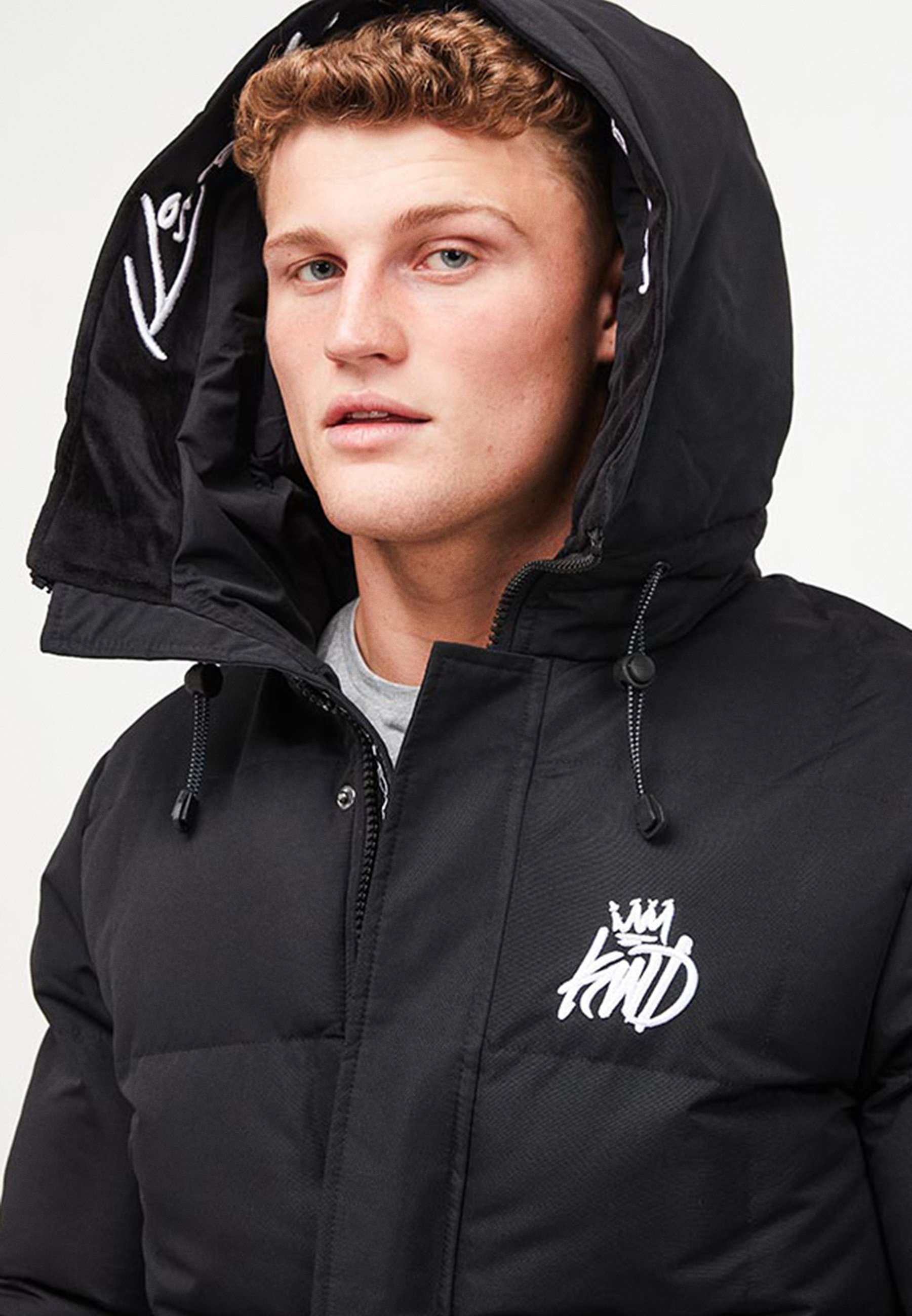 black puffy bomber jacket