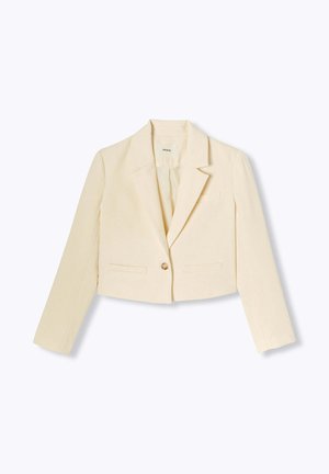 Blazer court en beige clair, fabriqué à partir d'un tissu lisse. Il est doté d'une fermeture à un bouton, de revers crantés et de deux poches avant.