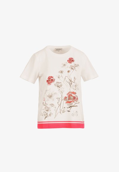 White short-sleeve T-shirt with red and beige floral print and red horizontal stripes at hem against plain background.
