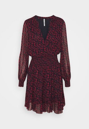 Red floral print dress with a deep V-neck, long sheer sleeves, and an elastic waist. Flowing hem hits mid-thigh, made from lightweight fabric.