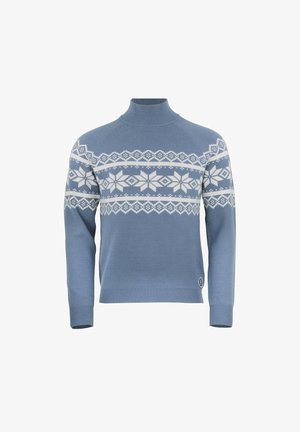 Pull à col roulé bleu avec des motifs blancs nordiques de flocons de neige et des motifs géométriques sur la poitrine et les parties supérieures des bras, poignets et ourlet côtelés.