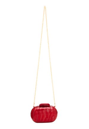 Red acrylic clutch bag with a rounded shape, smooth texture, and a gold chain strap. Features a top clasp and marbled finish.
