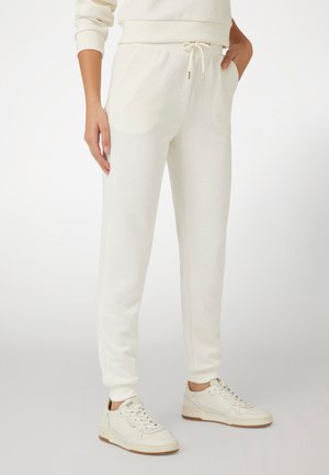 Guess PEONY-LOGO - Tracksuit bottoms - weiß