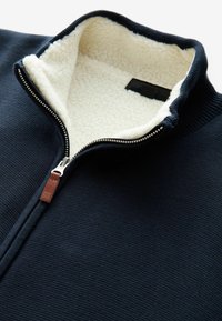 Next Kardiganas - navy borg lined