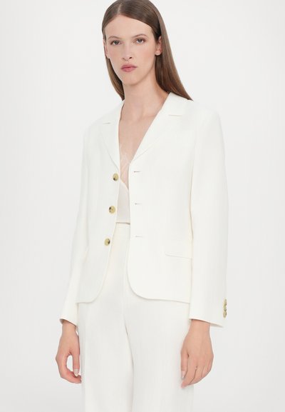 White fitted blazer with a single-breasted design, two buttons, and notch lapels; features two pockets and tailored sleeves.
