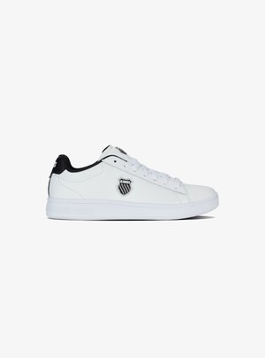 White leather sneakers with black accents, rounded toe, white laces, and K-Swiss shield logo on the side. Flat rubber sole.