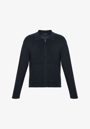 Veste zippée à manches longues bleu marine avec col et deux poches avant, en tissu tricoté.