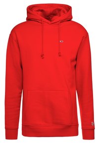 Felpa rossa con cappuccio, tasca frontale, corde regolabili, piccolo logo orizzontale sul petto e logo ricamato sul polsino sinistro della manica.