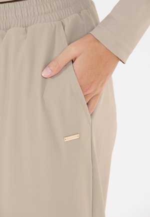 Athlecia, ENDURANCE - Pantaloni sportivi - dove