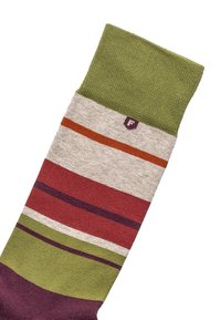 Stribet sok med grønne, beige, orange, røde og lilla farver. Blød tekstur med ribbet kant og en lille logo-detalje.