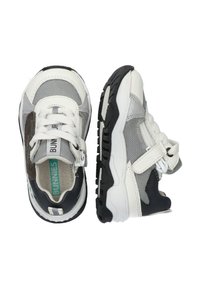 Sneakers featuring a mix of gray mesh, white leather, and black rubber sole; includes Velcro strap and branding accents.