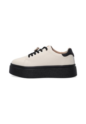 White leather sneaker with a textured finish, black lace-up closure, platform sole, and a small decorative accent on the front.