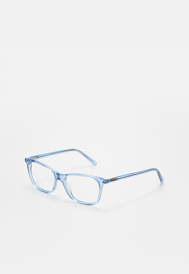 Gafas de lectura con montura de plástico azul y transparente en forma rectangular. Presentan un acento metálico "ROXY" en las patillas. Textura suave.