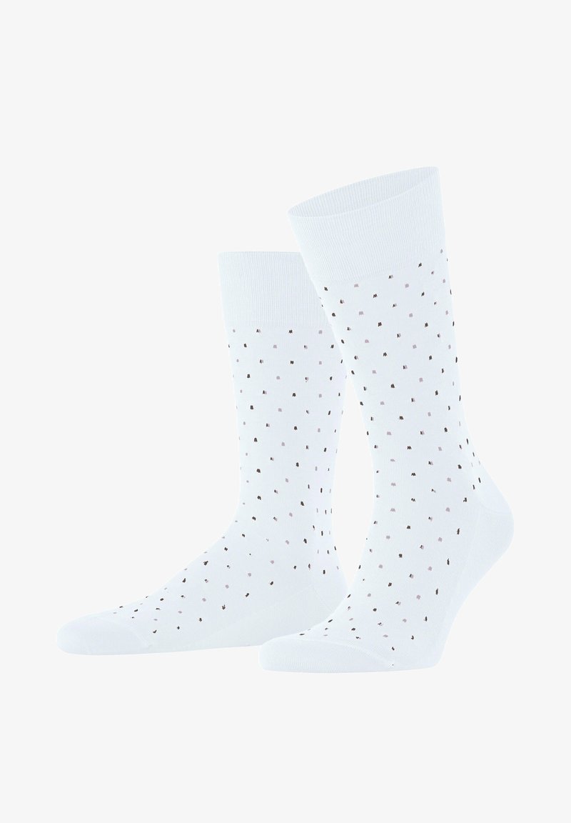 Weiße Baumwollsocken mit Pünktchen in hellrosa und braun. Sie verfügen über einen gerippten Saum und eine glatte Textur. Aufrecht positioniert für bessere Sichtbarkeit.