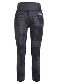 Czarne legginsy sportowe z teksturowanym, abstrakcyjnym wzorem. Wysoki stan, elastyczny materiał, z logo na górnej części nogawki.