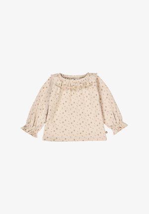 Cremfarbendes Babyshirt mit langen Ärmeln, das ein rosa und braunes Blumenmuster auf weißem Hintergrund zeigt. Es hat einen Rüschensaum am Kragen und elastische Rüschensäume an den Ärmeln.