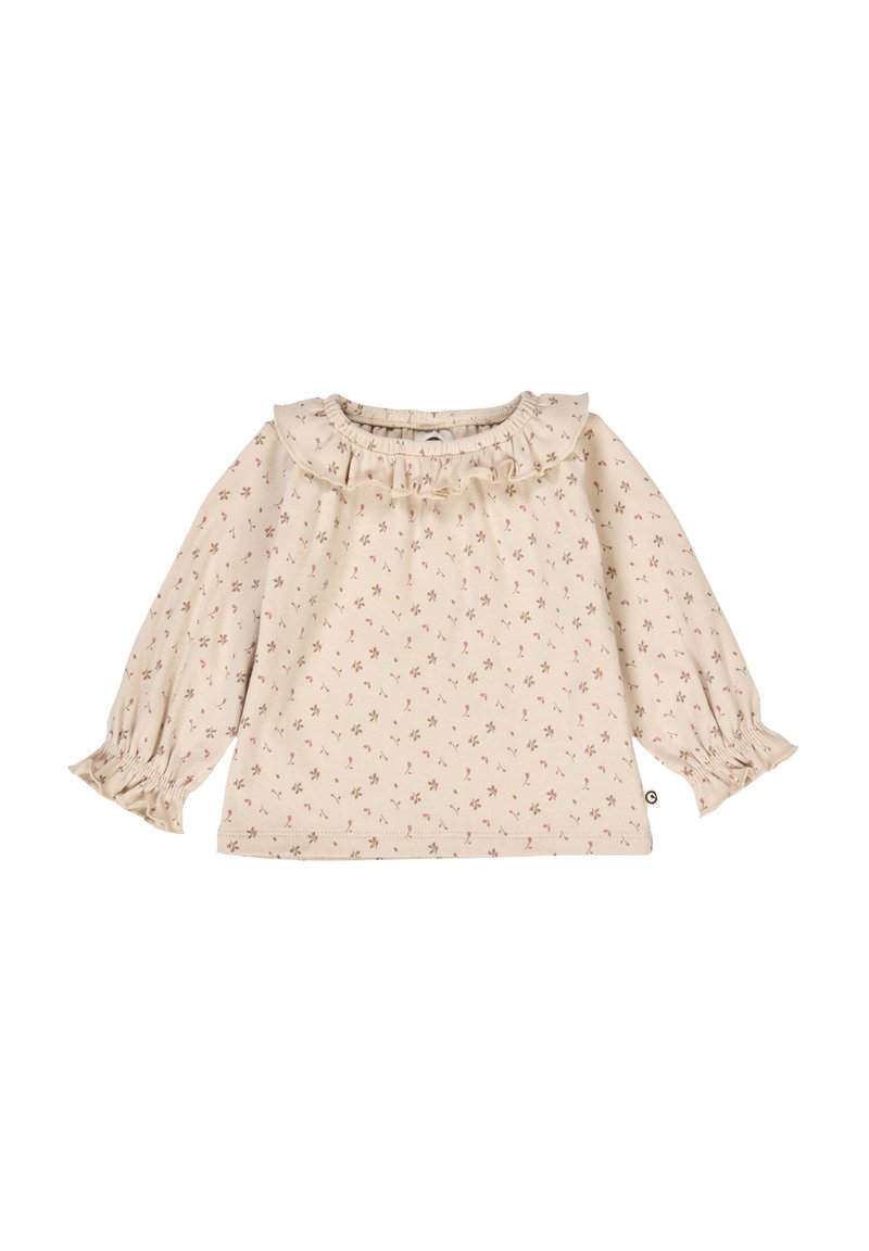 Cremfarbendes Babyshirt mit langen Ärmeln, das ein rosa und braunes Blumenmuster auf weißem Hintergrund zeigt. Es hat einen Rüschensaum am Kragen und elastische Rüschensäume an den Ärmeln.
