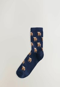 Navyblauwe sok met een patroon van cartoonberen in bruin en crème kleuren. Gemaakt van zacht materiaal, met een geribbelde boord en versterkte teen.