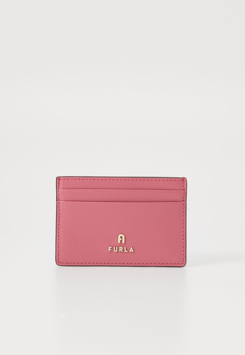 Pink leather cardholder with three card slots and gold Furla logo on front, set against white background.