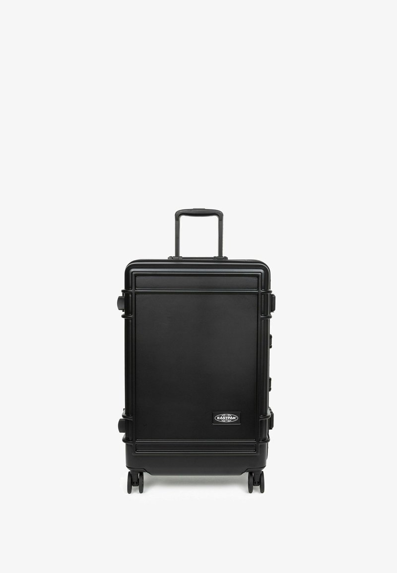 Black hard-shell suitcase with a telescopic handle, four wheels, and a logo. Smooth texture, rectangular shape, featuring minimalistic design.