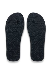 Μαύρα εσωτερικά πέλματα από καουτσούκ με υφή που απεικονίζει γεωμετρικά σχήματα και δύο κυκλικές οπές. Η κάτω όψη τονίζει το σχεδιασμό για καλύτερη πρόσφυση.