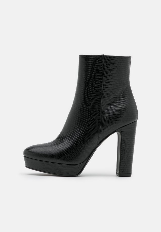 Bottines à talons hauts - noir