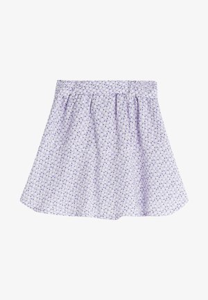 Lyse lilla nederdel med små mørke polkaprikker og subtilt hvidt blomsterprint, samlet ved taljen for en vidde form.