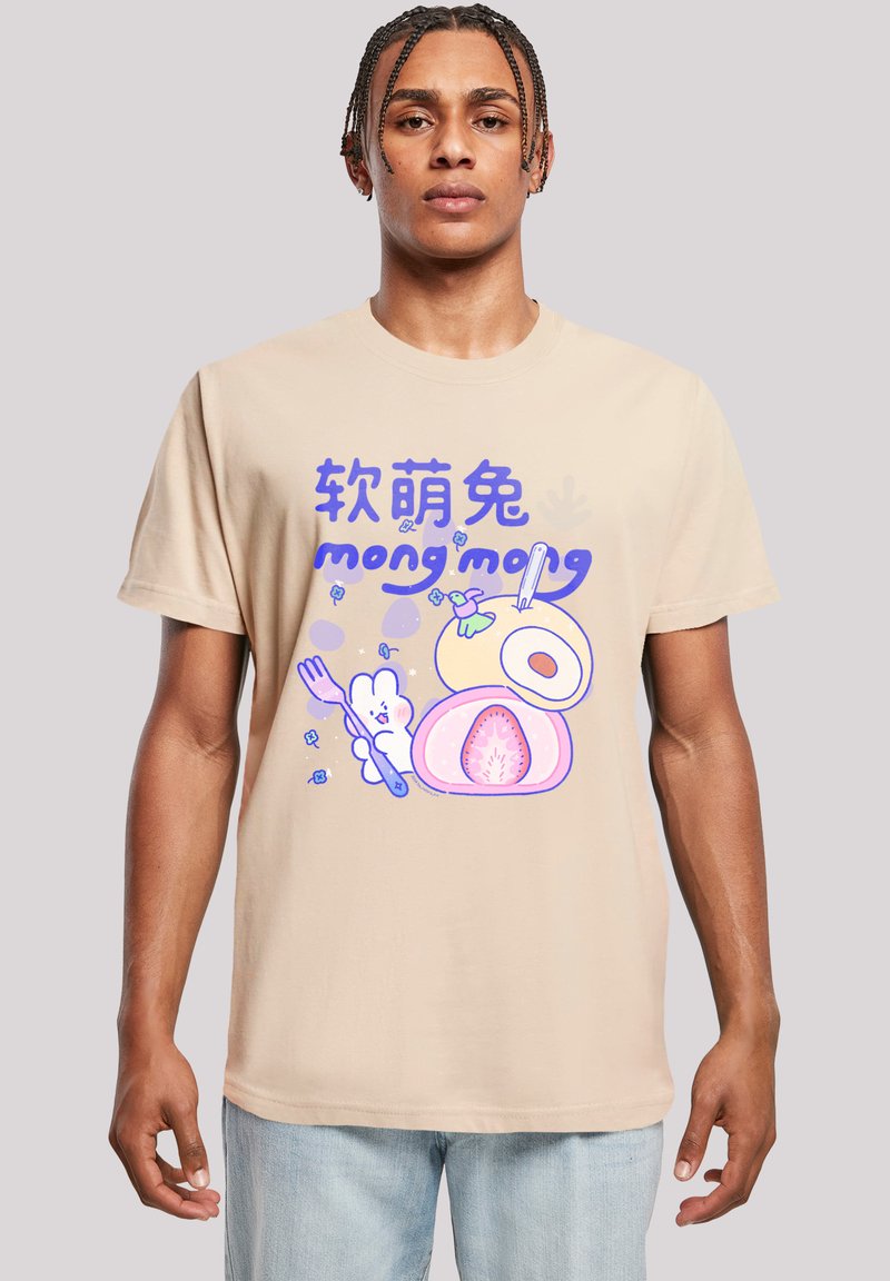 Beige cotton t-shirt with a graphic design featuring pink fruit and a cartoon character, accented with blue text "mong mong." Short sleeves.