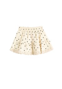 Gonna beige chiaro con pois neri, design a volants a strati, vita elastica e bordo in pizzo all'orlo. Materiale in misto cotone.