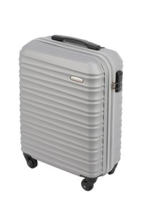Silver hard-shell suitcase with ribbed texture, double zipper, and black handle; features four wheels for mobility.