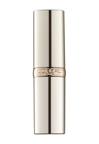 Läppstift i metalliskt silver med en slät yta och rund form. En guldfärgad accentband nära mitten visar varumärket.