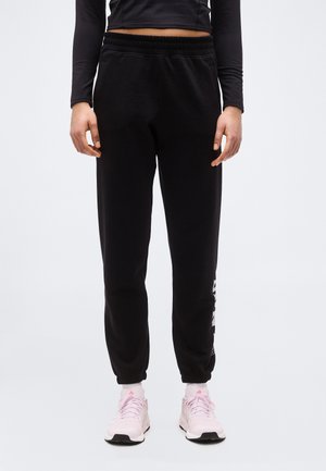 1989 RHINESTUD LOGO HIGH RISE - Παντελόνι φόρμας - black