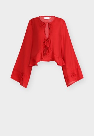 Rote, leichte, kurze Bluse mit gerafftem Saum, gebundenem Ausschnitt und weiten Ärmeln mit gebundenen Akzenten an den Manschetten. Strukturierter Stoff.