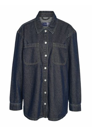 Mørk denimskjorte med krage, lange ermer, to brystlommer og knappelukking. Har kontrasterende sømmer og en avslappet passform.