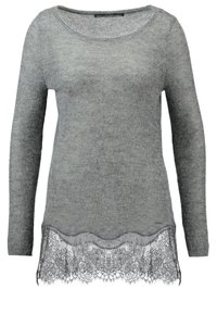 Pull à manches longues gris avec un col rond, ornée d'une finition en dentelle en bas. Fabriqué en laine douce avec une texture lisse.