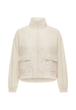 Hellbeige Jacke mit Reißverschluss, hohem Kragen, langen Ärmeln mit elastischen Bündchen und zwei vorderen Klappentaschen.