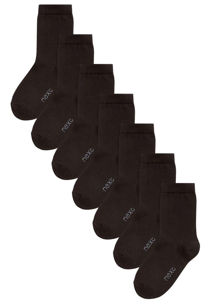 Ensemble de huit chaussettes noires en coton avec texture côtelée et orteil renforcé. Chaque chaussette présente un petit logo blanc sur le côté.