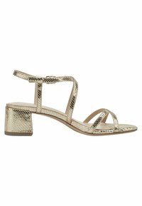Gold metallic heeled sandals with a snake print finish. Features a block heel, thin straps, and an ankle buckle closure. Flat sole.