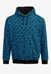 Modrá mikina s kapucí a geometrickým černým vzorem, se stahovacími šňůrkami, kapsou na břiše a černými žebrovanými lemy na rukávech a spodním okraji. Hladká textura.