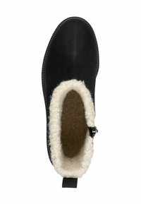 Zwarte enkelboot met een gladde buitenkant, fuzzy crèmekleurige voering, ronde neus en een lipje aan de achterkant voor gemakkelijke instap.