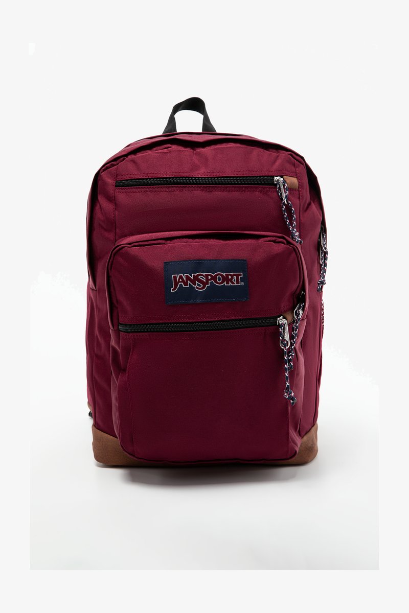 Sac à dos bordeaux avec plusieurs poches zippées, en tissu, avec patch logo, zips noirs et accent inférieur marron. Dispose de bretelles rembourrées.