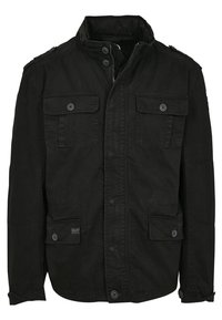 Svart jacka av tyg med ståkrage, flera framfickor och knapplåsning. Texturerad yta med en avslappnad design.